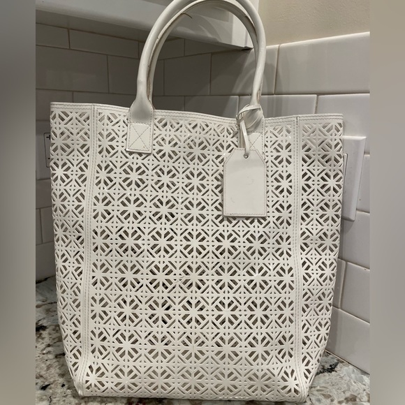 Tory Burch Handbags - Tory Burch Eyelet tote pvc white bag